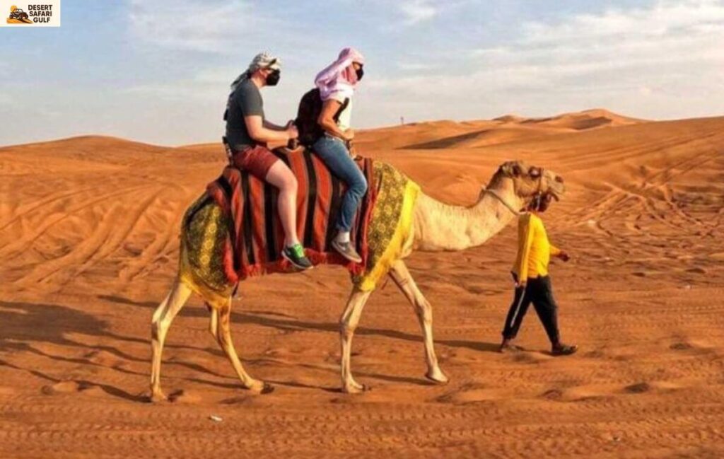 Camel ride experience at Dubai desert safari with scenic sunset views