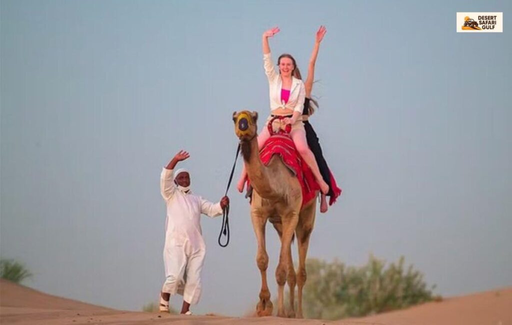Tourists enjoying evening desert safari Dubai experience